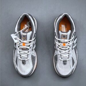 New Balance White and Gray Sneakers with Orange Accents